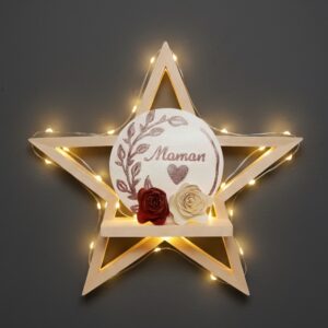 Magnet "Maman", sur une étagère lumineuse en forme d'étoile.